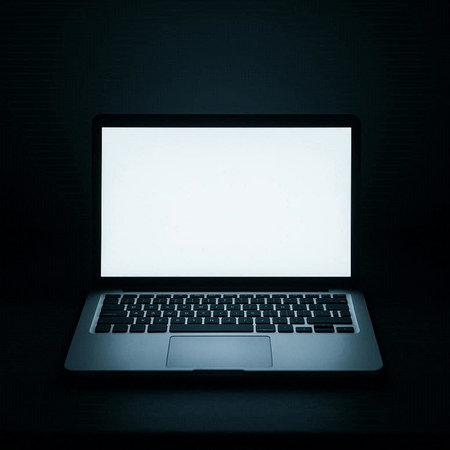 Laptop with blank screen on black background. 3d illustration.の写真素材