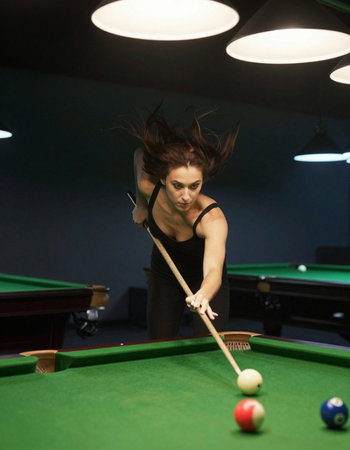 young pro billiard player finding best solution at billard or snooker pool sport  gameの写真素材