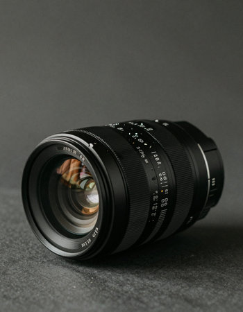Camera lens on a dark background. Close-up of a camera lens.