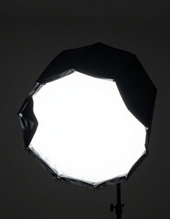 Photo studio lighting equipment on dark background. Studio lighting equipment on dark background.