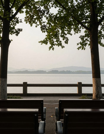 Sunset at the lake in Hangzhou, China. Hangzhou is a popular tourist destination.