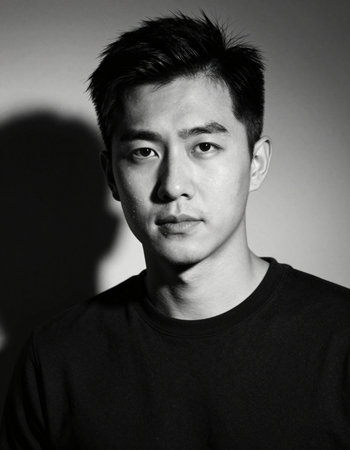 Portrait of a handsome young asian man in black and white