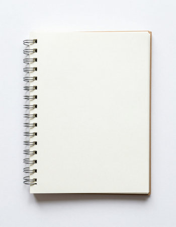 Blank notebook on white paper background with copy space for text.