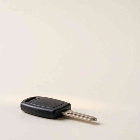 Car key with remote control on a white background. Place for text.