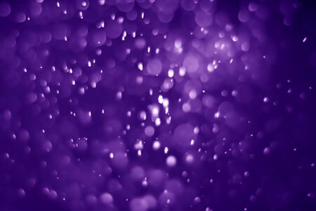 Bokeh purple proton background abstractの写真素材