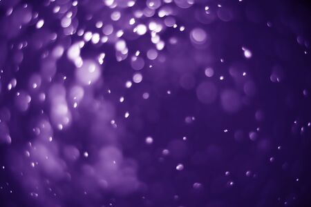Bokeh purple proton background abstractの写真素材