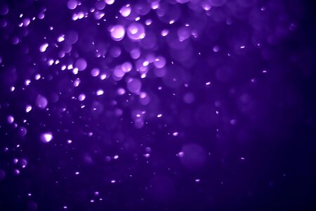 Bokeh purple proton background abstractの写真素材
