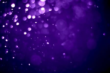 Bokeh purple proton background abstractの写真素材