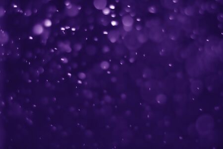 Bokeh purple proton background abstractの写真素材