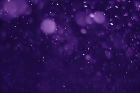 Bokeh purple proton background abstractの写真素材