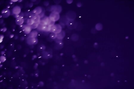 Bokeh purple proton background abstractの写真素材
