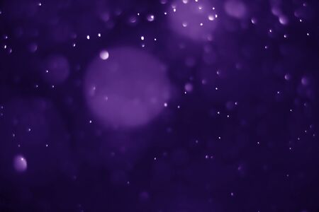 Bokeh purple proton background abstractの写真素材