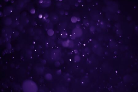 Bokeh purple proton background abstractの写真素材