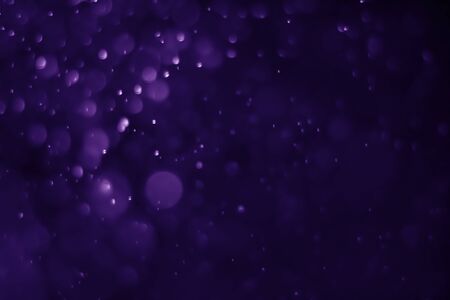 Bokeh purple proton background abstractの写真素材