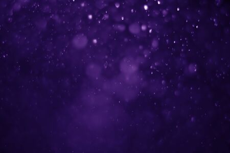 Bokeh purple proton background abstractの写真素材