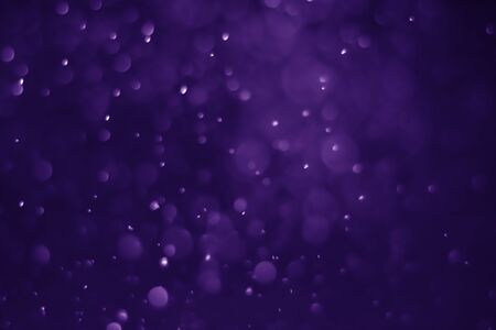 Bokeh purple proton background abstractの写真素材