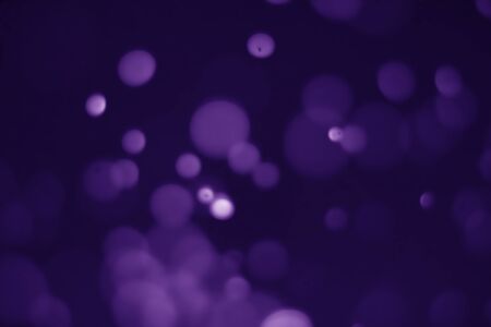 Bokeh purple proton background abstractの写真素材