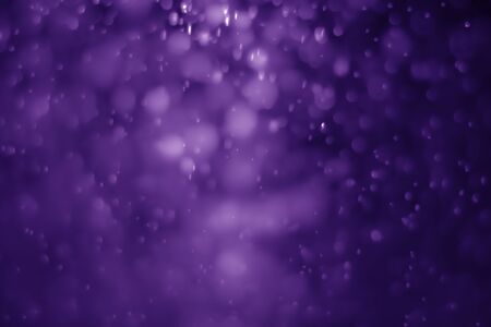 Bokeh purple proton background abstractの写真素材