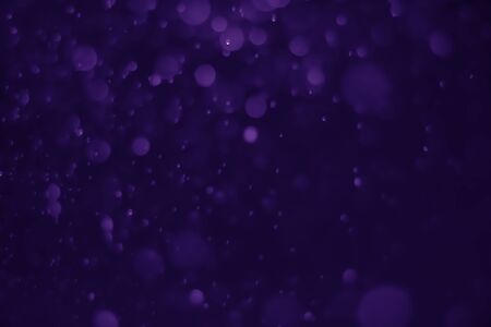 Bokeh purple proton background abstractの写真素材