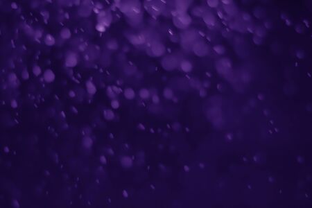 Bokeh purple proton background abstractの写真素材
