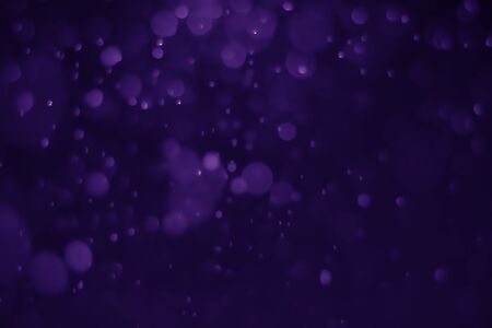 Bokeh purple proton background abstractの写真素材