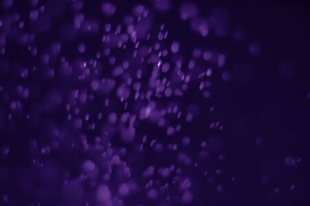 Bokeh purple proton background abstractの写真素材