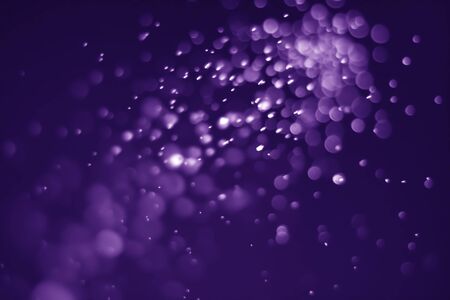 Bokeh purple proton background abstractの写真素材
