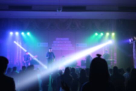 People in parties or celebrations blur at night.の写真素材