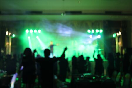 Teenage party with people blurred backgroundの写真素材
