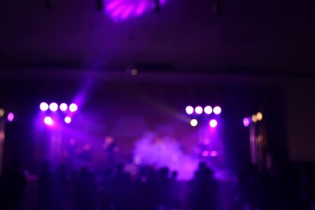 Teenage party with people blurred backgroundの写真素材