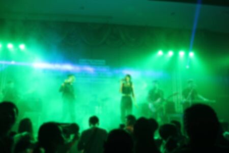 People in parties or celebrations blur at night.の写真素材