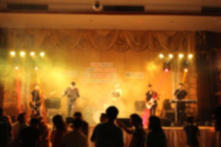 People in parties or celebrations blur at night.の写真素材