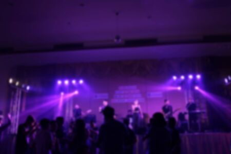 People in parties or celebrations blur at night.の写真素材