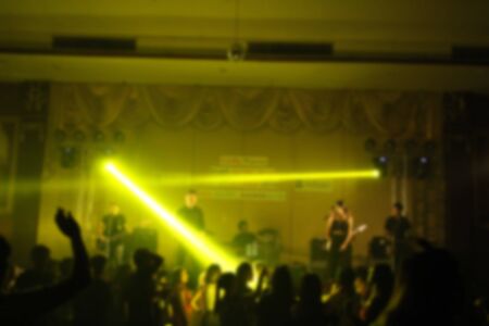 People in parties or celebrations blur at night.の写真素材