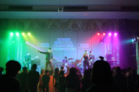 People in parties or celebrations blur at night.の写真素材
