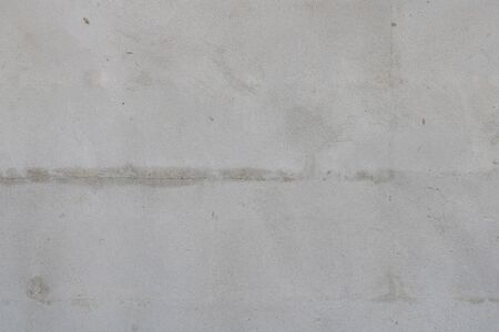 Cement walls with cracks and dirtの写真素材