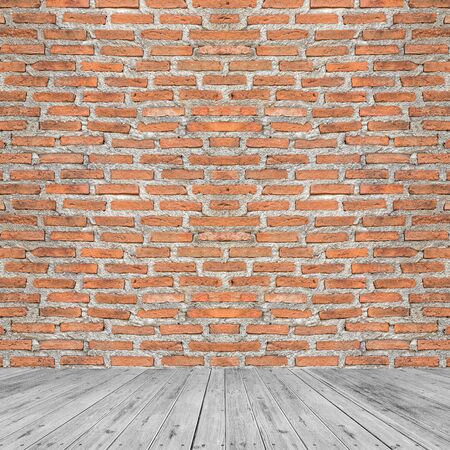 Red brick walls and wooden floors are combined into empty rooms and backgrounds.の写真素材