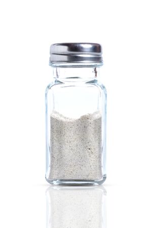 Ground pepper in a jar Isolated on white backgroundの写真素材