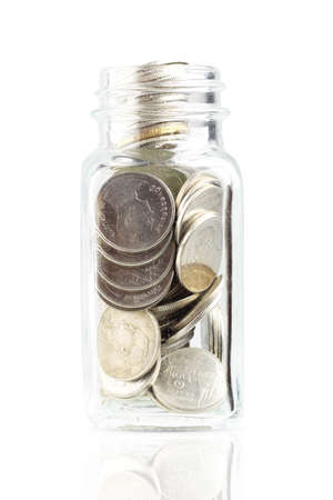 Coins in jars Isolated on white background, financeの写真素材