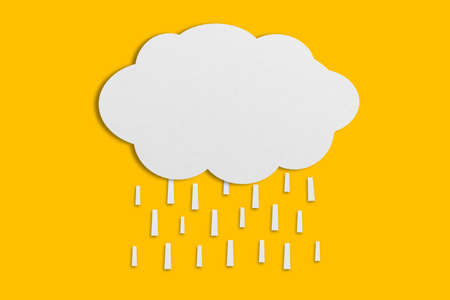 cloud and rain paper white paper cut and paste paper Speech balloon on yellow background design.の写真素材