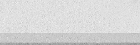 Gray horizontal decorative cement wall. Room background. Abstract wallpaper background. Backdrop. Cement floor.の写真素材