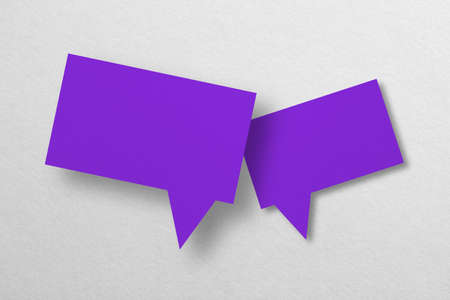 purple paper cut speech balloon shape isolated on white background.designの写真素材