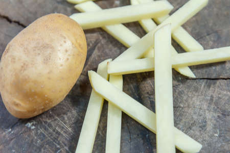 Preparing french fries for family on an asian family Weekend .の写真素材