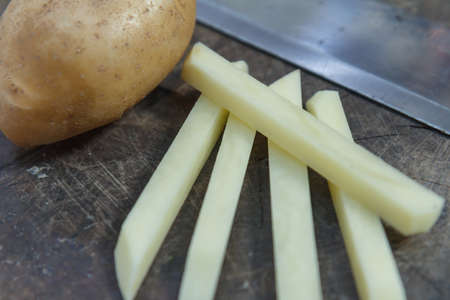 Preparing french fries for family on an asian family Weekend .の写真素材