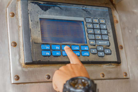 Technician observed and check operating machinery and equipment in sea off shore thailandの写真素材