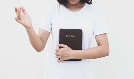 Woman prayer on bible, worship and religion. concept for faith, old Bible. copy spaceの写真素材