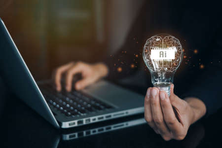 Women holding light bulbs, ideas of new ideas with innovative technology and creativity. Creative idea. Concept of idea and innovationの写真素材