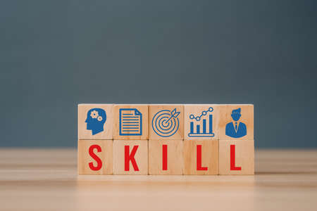 SKILL Wooden blocks with SKILL text of concept. Creation of a successful company. Development of leadership organizational skills. Business tools services. Stimulating entrepreneurship.の写真素材