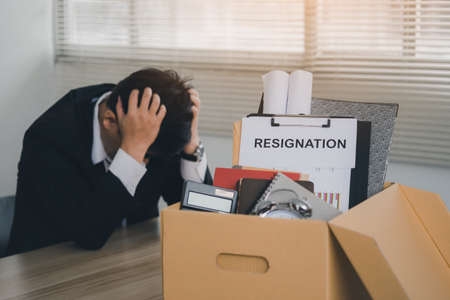 Unemployment, Resigned concept. Employees who intend to quit work with resignation letters for quit or change of job leaving the office.の写真素材