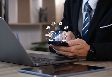 artificial intelligence Businessman using AI smart robot technology inputting commands to analyze data and build something. future technology changes. Chatbot chat AI conceptの写真素材